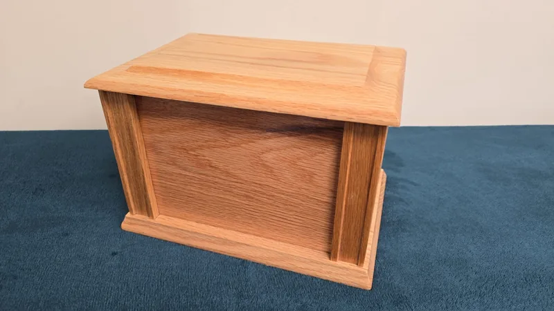 The Adelphi — a light oak ashes casket